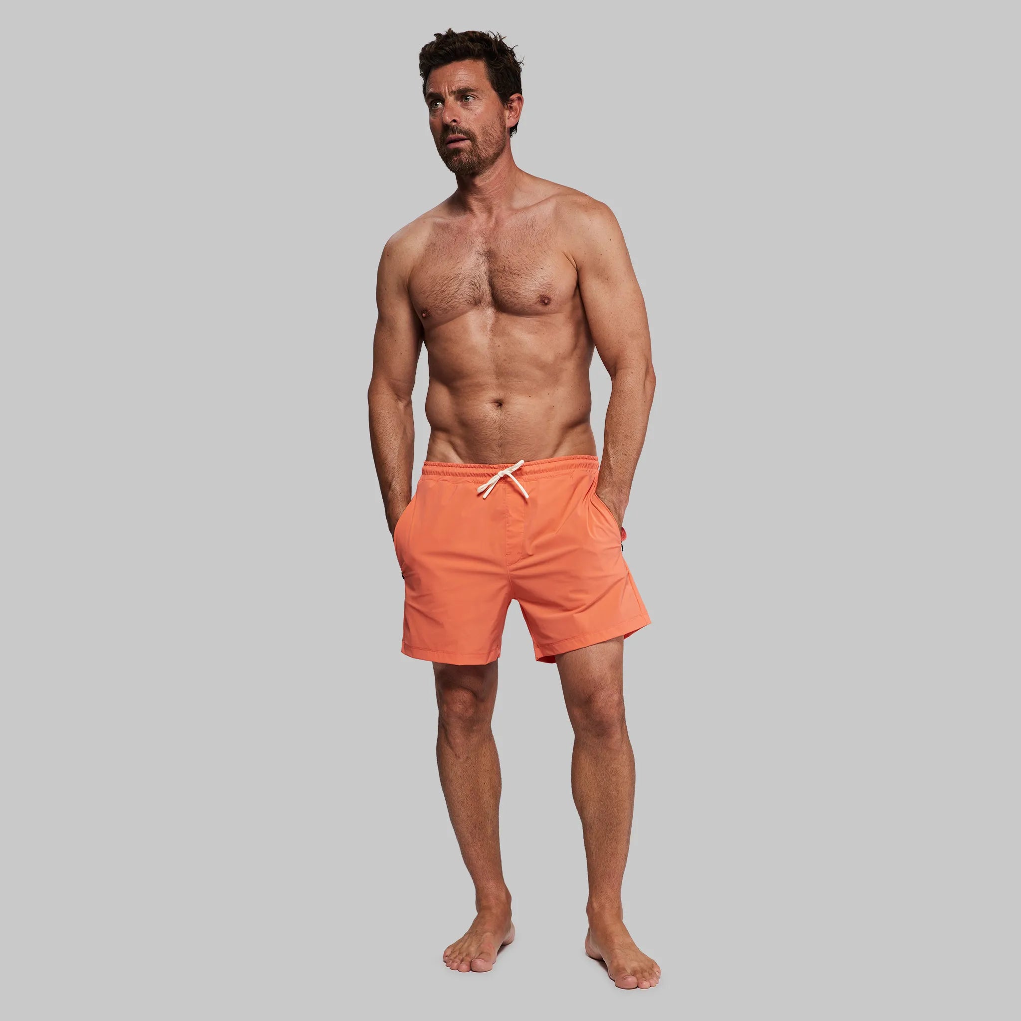 Men's Patterned Pants with Geometric DesignsEquator Swim Shorts. Coral Pink edition