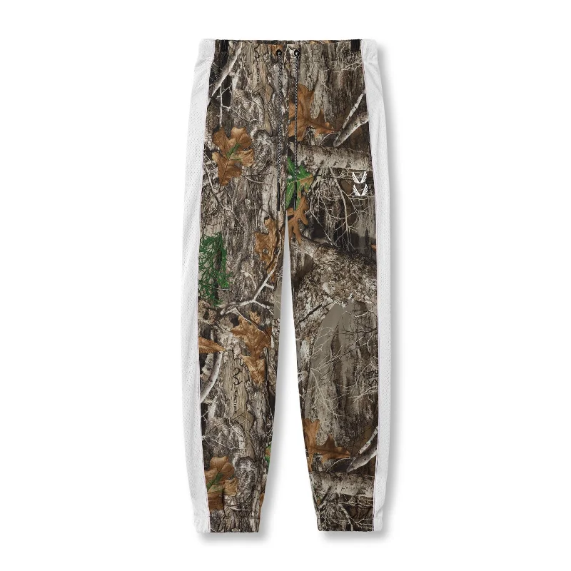 Men's Pants with Button-Down Pockets0796. Ripstop Oversized Track Pant - Realtree® Camo