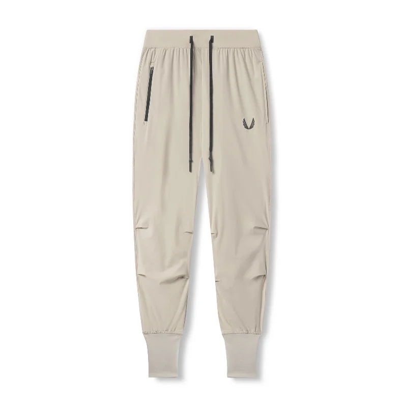 Men's Tapered Pants for a Slimming Effect0826. Tetra-Lite™ High Rib Jogger - Sand Smoke